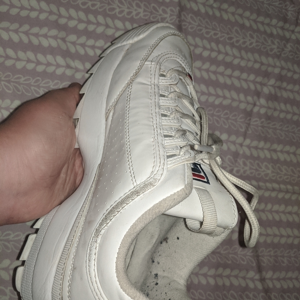 White Fila disruptors